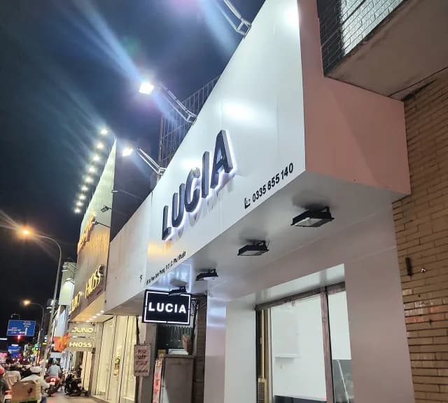 Thi công bảng hiệu LUCIA vào ban đêm tại Quận Phú Nhuận